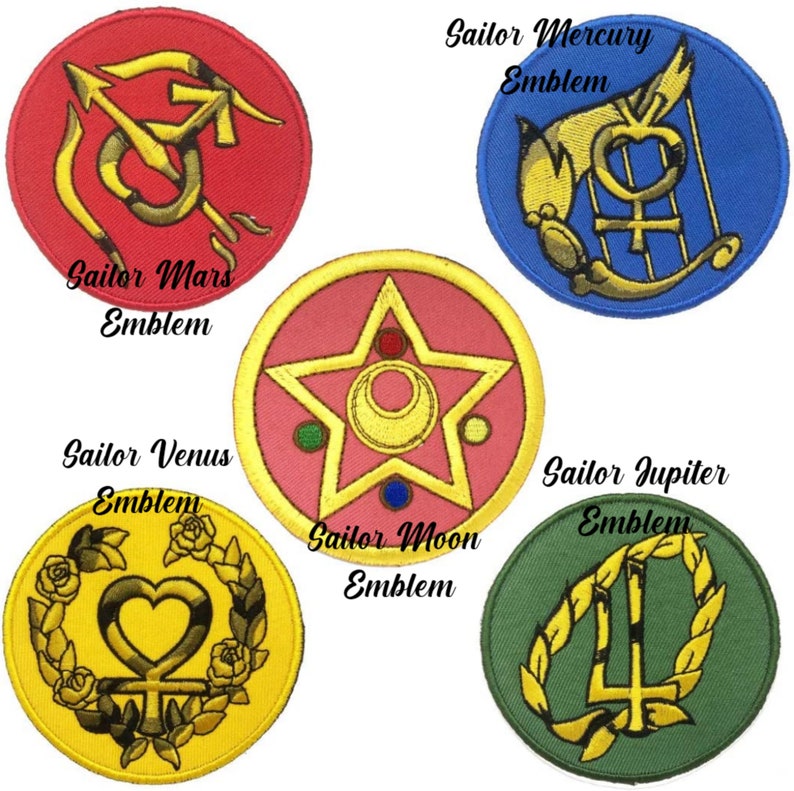 May include: Five embroidered patches featuring Sailor Moon emblems. Each patch is circular with a different color background and a unique design. The patches include Sailor Mars, Mercury, Venus, Moon, and Jupiter emblems, with text labels.