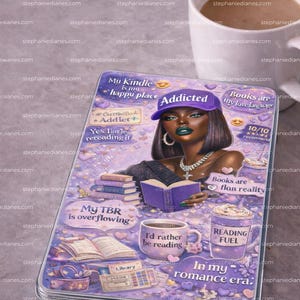 May include: A purple Kindle case with a graphic of a woman wearing a purple cap and the word "Addicted". The case has text that reads "My Kindle is my happy place" and "Books are my love language". A cup of coffee is in the background.