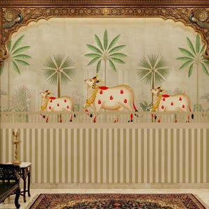 May include: A decorative wall mural featuring three stylized white cows with red handprints, gold accents, and ornate headwear. The cows are positioned above a striped wall, with palm trees and a decorative archway in the background. The mural has a traditional Indian aesthetic.