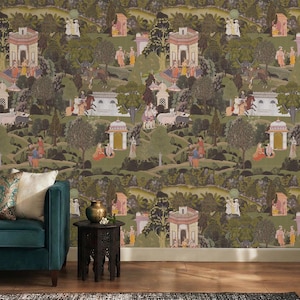 May include: Wallpaper featuring a detailed, repeating pattern of an Indian landscape with figures, buildings, and trees in shades of green, brown, and pink. A teal sofa with pillows and a dark wood side table are in the foreground.