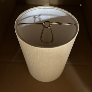 Champagne silk shantung fabric hardback lamp shades . Candle clip. Dims: 4&quot; x 4&quot; x 6&quot;