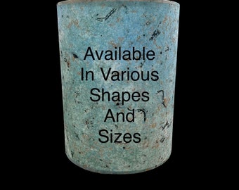 May include: A blue, textured, cylindrical container with the text "Available in Various Shapes And Sizes" printed on it.