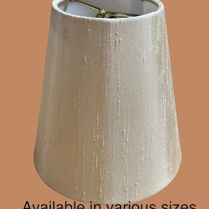 Champagne silk shantung fabric hardback lamp shades in various sizes and fitters, spider top, regular bulb clip on & Candle clip.