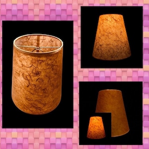 Copper Mulberry paper hardback lamp shades in various sizes. Available with spider tops, regular bulb clip, and candle clip.