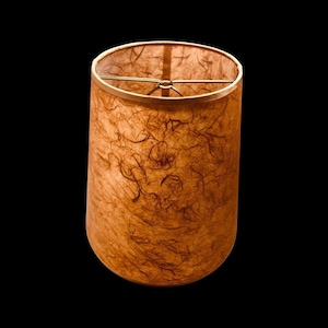 Copper Mulberry parchment paper hardback lamp shades in various sizes. Available with spider tops, regular bulb clip, and candle clip.