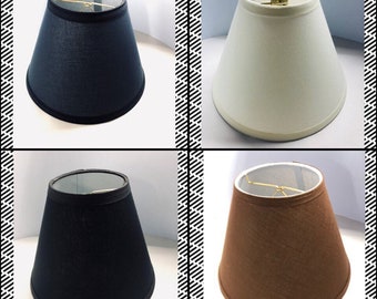 REGULAR BULB clip on cloth fabric hardback lamp shades in various colors and sizes. Available in Off white, Navy, Brown and black.