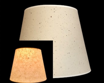 Natural flex paper parchment  hardback lamp shades in various sizes including chandelier candle clip or regular bulb clip on sizes.
