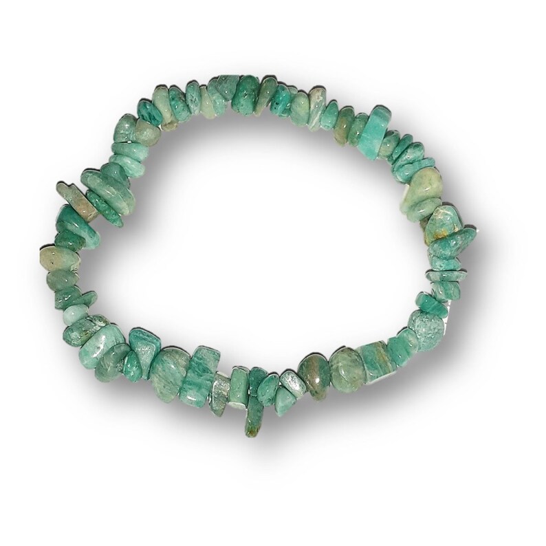 May include: A green gemstone bracelet made of small, irregular shaped beads. The bracelet is made of natural stones and is a popular choice for those who enjoy wearing jewelry with a natural look.