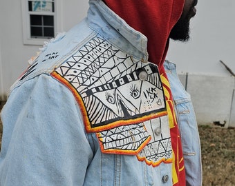 Hand-Painted Denim Vest: Custom 16 Odu Ifa Design