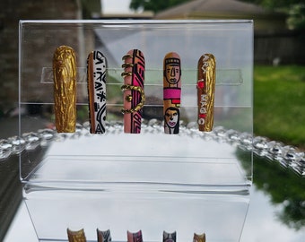 Press on nails with hand drawn ART.