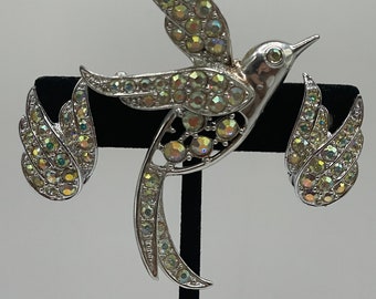 Vintage Sarah Coventry 1960s "Bird of Paradise" set of brooch and matching wing-shaped silver-tone clip-on earrings