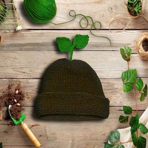 Czapka Sprout z ruchomym liściem lub pędem paproci - ręcznie robiona na drutach z bardzo miękkiej włóczki - Sprout stoi samodzielnie i porusza się, gdy się poruszasz.