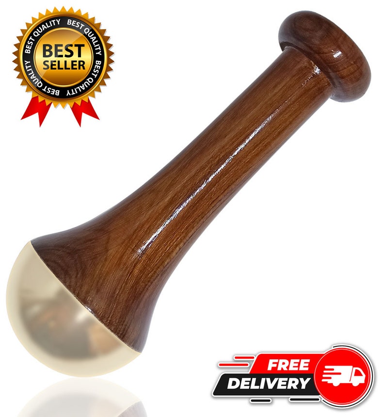 May include: A wooden mortar and pestle with a polished finish. The pestle has a rounded handle and a gold-colored base. The mortar and pestle are designed for grinding herbs and spices. The image also includes a "Best Seller" badge.