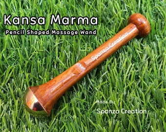 Masajeador de acupresión ayurvédico con forma de lápiz Kansa Wand para aliviar el estrés y desintoxicar.