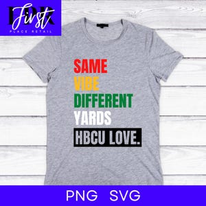 May include: Grey t-shirt with the text "SAME VIBE DIFFERENT YARDS HBCU LOVE." in colourful block letters.