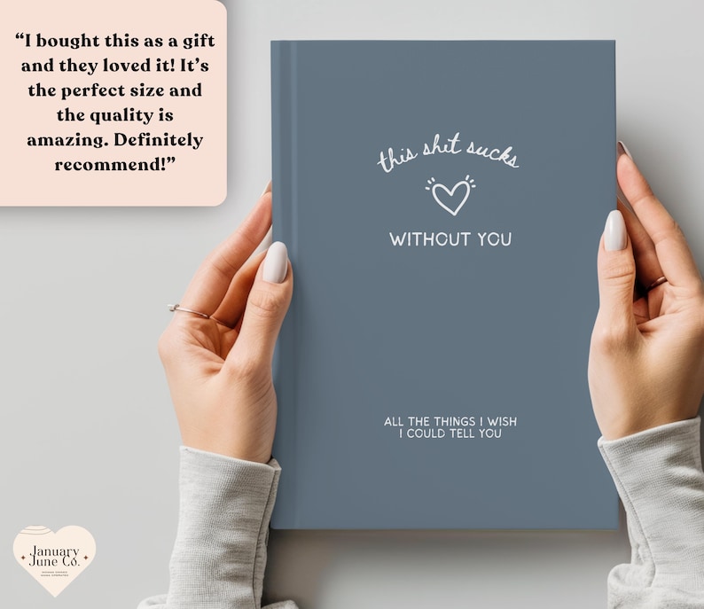 May include: A blue journal with the text "this shit sucks without you" and "All the things I wish I could tell you." The journal is held by a person.