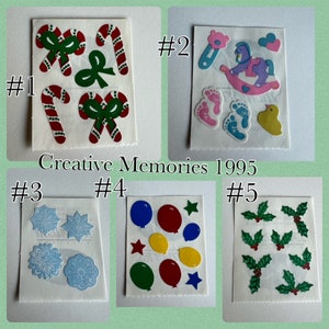 May include: Five sheets of stickers with various designs. Sheet #1 has candy canes and bows. Sheet #2 has a rocking horse, a pacifier, and footprints. Sheet #3 has snowflakes and flowers. Sheet #4 has balloons and stars. Sheet #5 has holly leaves. All sheets have the text "Creative Memories 1995".