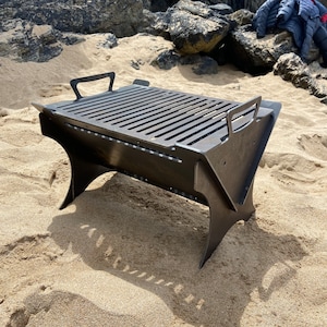 Collapsible BBQ grill and fire pit. perfect for camping, the beach and garden. includes grill! portable, slot together Made in UK