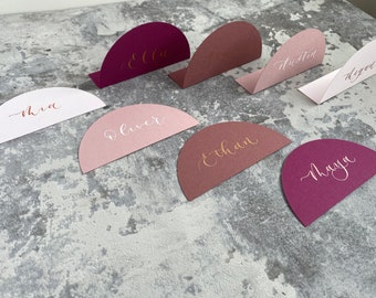 Wedding and event arch place cards | pink shades with calligraphy names | place setting table stationery | blush dusty rose