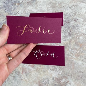 calligraphy wedding and event flat place cards rich pink magenta orchid hand lettered personalised guest name setting image 2