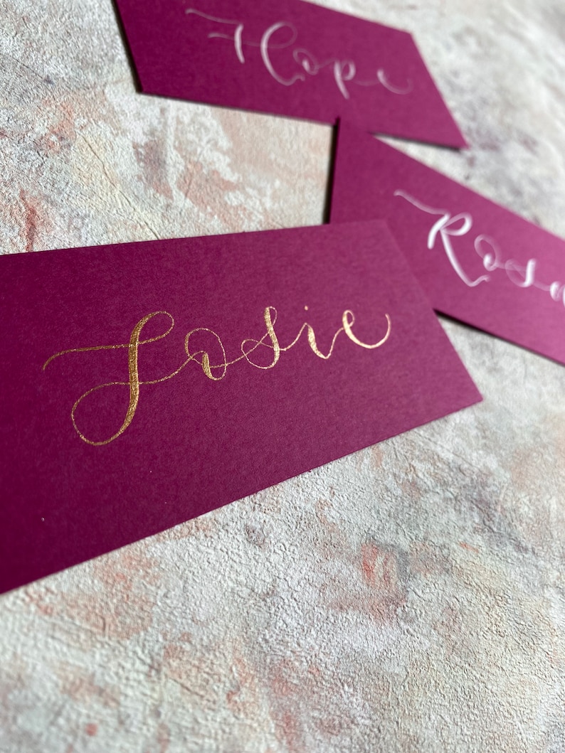 calligraphy wedding and event flat place cards rich pink magenta orchid hand lettered personalised guest name setting image 1