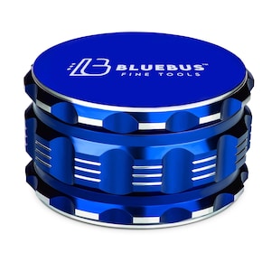 May include: A blue metal grinder with the text "Bluebus Fine Tools" on the top. The grinder has a silver trim and a textured design.