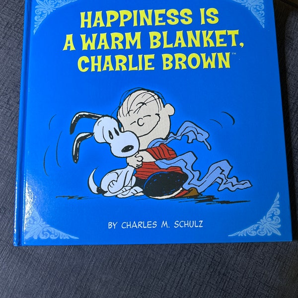 Peanuts “Happiness is a Warm Blanket” Charles M. Schulz Hardcover