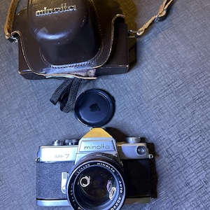 ジャンク】PENTAX SP/Nikomatt/Minolta SR-7など8台 il_fullxfull.6988067760_515b.jpg