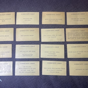 1935 年モノポリー コミュニティ チェスト カード「16 枚のカード」プレ写真と特許 (良好～非常に良好)