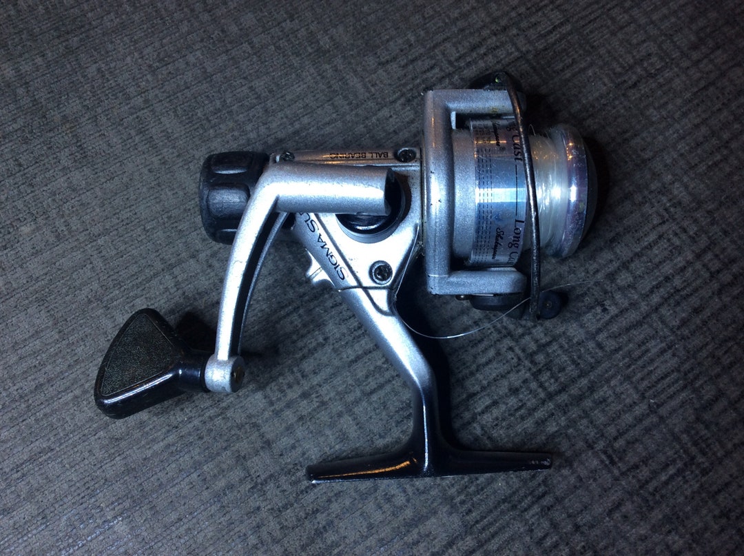 Shakespeare Sigma Supra Spinning Reel 025 works Great 