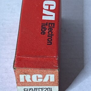 May include: A red box with white text that reads "RCA Electron Tube 6U9/ECF201".
