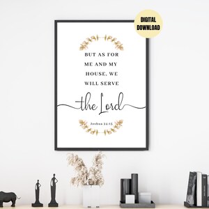 May include: A printable wall art design with a white background and black text. The text reads "But as for me and my house, we will serve the Lord. Joshua 24:15". The text is surrounded by a wreath of brown and gold leaves.