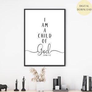 May include: Black and white printable wall art with the text "I am a child of God" and the scripture reference "John 1:12".