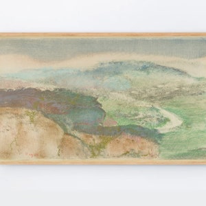 May include: A pastel landscape painting with a river winding through a valley. The painting is framed in a light wood frame. The artist's signature is visible in the lower right corner.