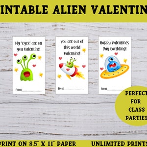 May include: Three printable Valentine's Day cards featuring alien illustrations. The first card shows a green alien with three eyes and the text "My 'eyes' are on you Valentine!" The second card shows a green alien in a rocket ship with the text "You are out of this world Valentine!" The third card shows a blue alien in a flying saucer with the text "Happy Valentines Day Earthling!" Each card has a blank line for the sender's name.