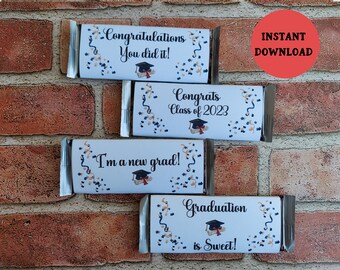 May include: Four printable chocolate bar wrappers with graduation themes. The wrappers feature confetti, graduation caps, and diplomas. The text on the wrappers reads "Congratulations You did it!", "Congrats Class of 2023", "I'm a new grad!" and "Graduation is Sweet!"
