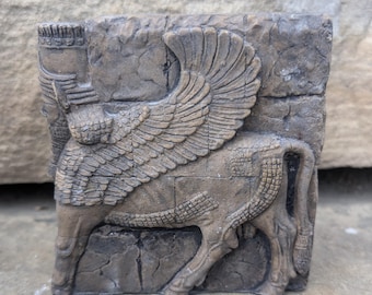 Assyrian Persian lamassu or shedu winged  bull human face fragment on stand 6"