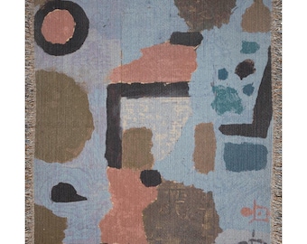 May include: Abstract woven tapestry with geometric shapes in shades of brown, pink, blue, and black on a light blue background.