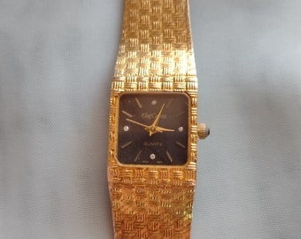 Vintage Oleg Cassini Working Condition Gold Tone Weave Band Wrist Watch Unisex