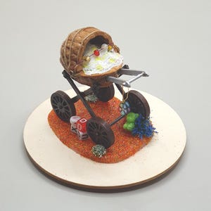 Ornamento a forma di carrozzina in miniatura, culla delle fate in guscio di noce, regalo originale e stravagante