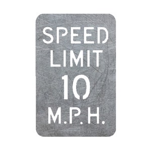 May include: A gray metal sign with white text that reads "SPEED LIMIT 10 M.P.H."