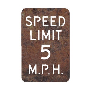 May include: A rusty metal sign with white text that reads "SPEED LIMIT 5 M.P.H."