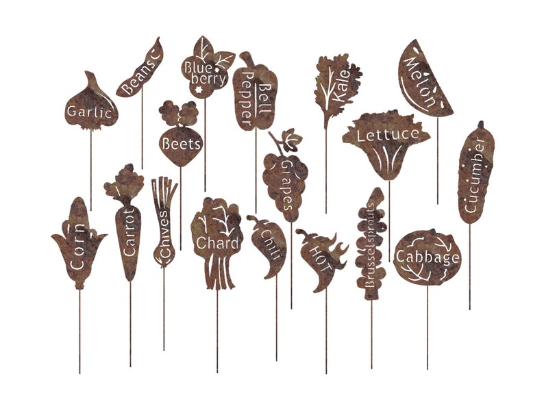 May include: A set of 16 metal garden markers with rusty brown finish. Each marker features a different vegetable or fruit, including corn, beans, garlic, beets, carrot, chives, chard, grapes, bell pepper, chili, brussel sprouts, kale, lettuce, cabbage, melon, and cucumber.