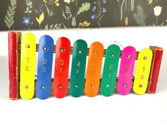 Vintage child's xylophone toy instrument