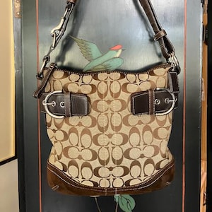 Coach Brown & Tan Signature Jacquard Soho Shoulder/Crossbody Bag With Brown Suede Bottom #F05K-3574 And Logo Charm Tag Attached!