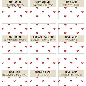 May include: Nine printable gift tags with a red heart pattern and a white background. Each tag has a different message in German, such as "Bist mein Superheld" (You are my superhero) and "Bist der tollste Mensch der Welt" (You are the greatest person in the world).