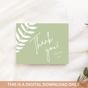 May include: A green thank you card with a white fern design and the text "Thank you!" in white cursive writing. The text "business name" is also included in white.