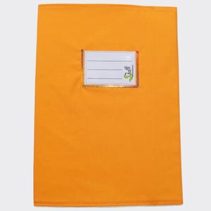 May include: A rectangular orange fabric book cover featuring a centered white label with three horizontal black lines for writing. The label is bordered by a metallic gold trim and includes the green text logo Stoffi printed on the bottom right corner.