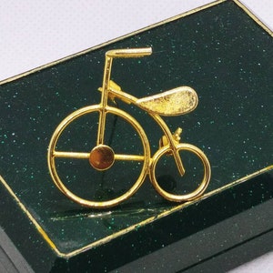 Vintage sportfiets fietsbroche sportbroche/speld goudkleur