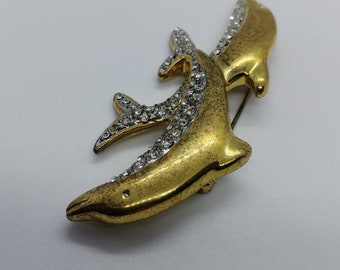 クリスタルのアクセントが付いたヴィンテージゴールドトーンのイルカ